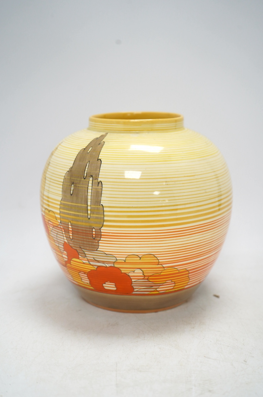 A Clarice Cliff Bizarre vase, Capri pattern,17cm high. Condition - fair to good